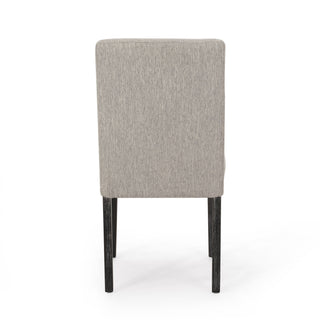 Contemporary Dining Chair With Upholstered Seating And Tapered Legs